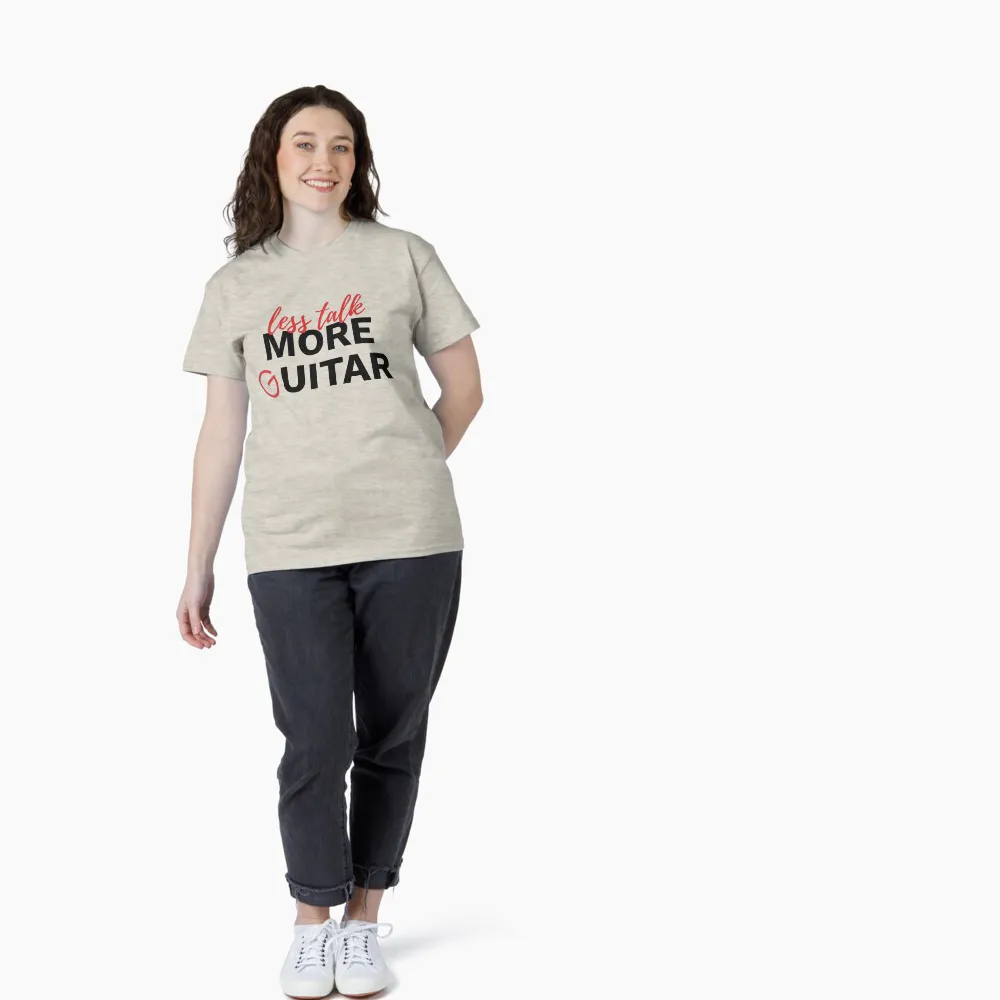 Female model wearing a T-shirt that says "Less Talk. More Guitar".